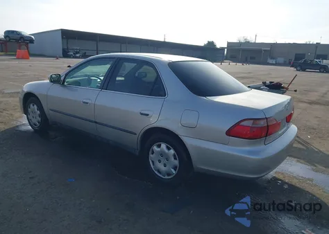 1999 Honda Accord Lx z USA, uszkodzony, nr VIN 1HGCG6651XA002487